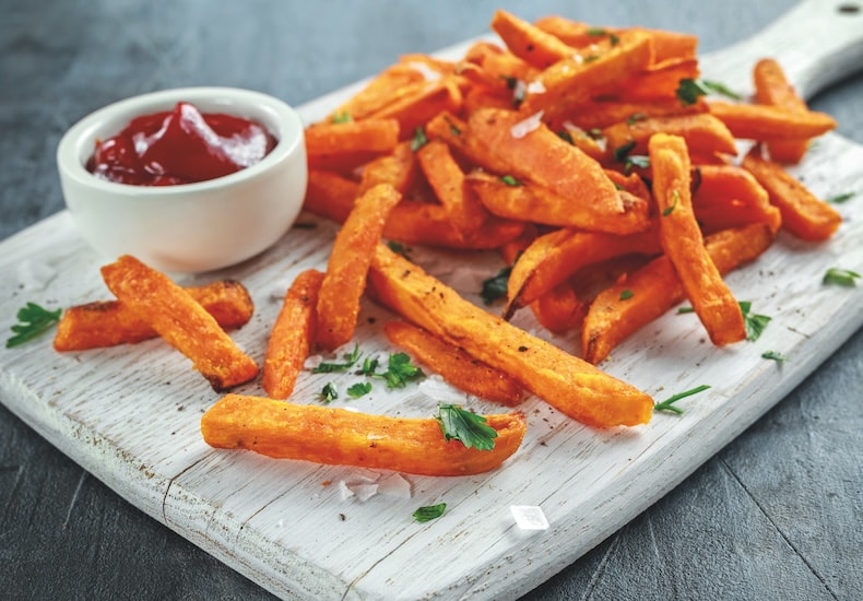 Sweet potato white wooden tray with ketchup